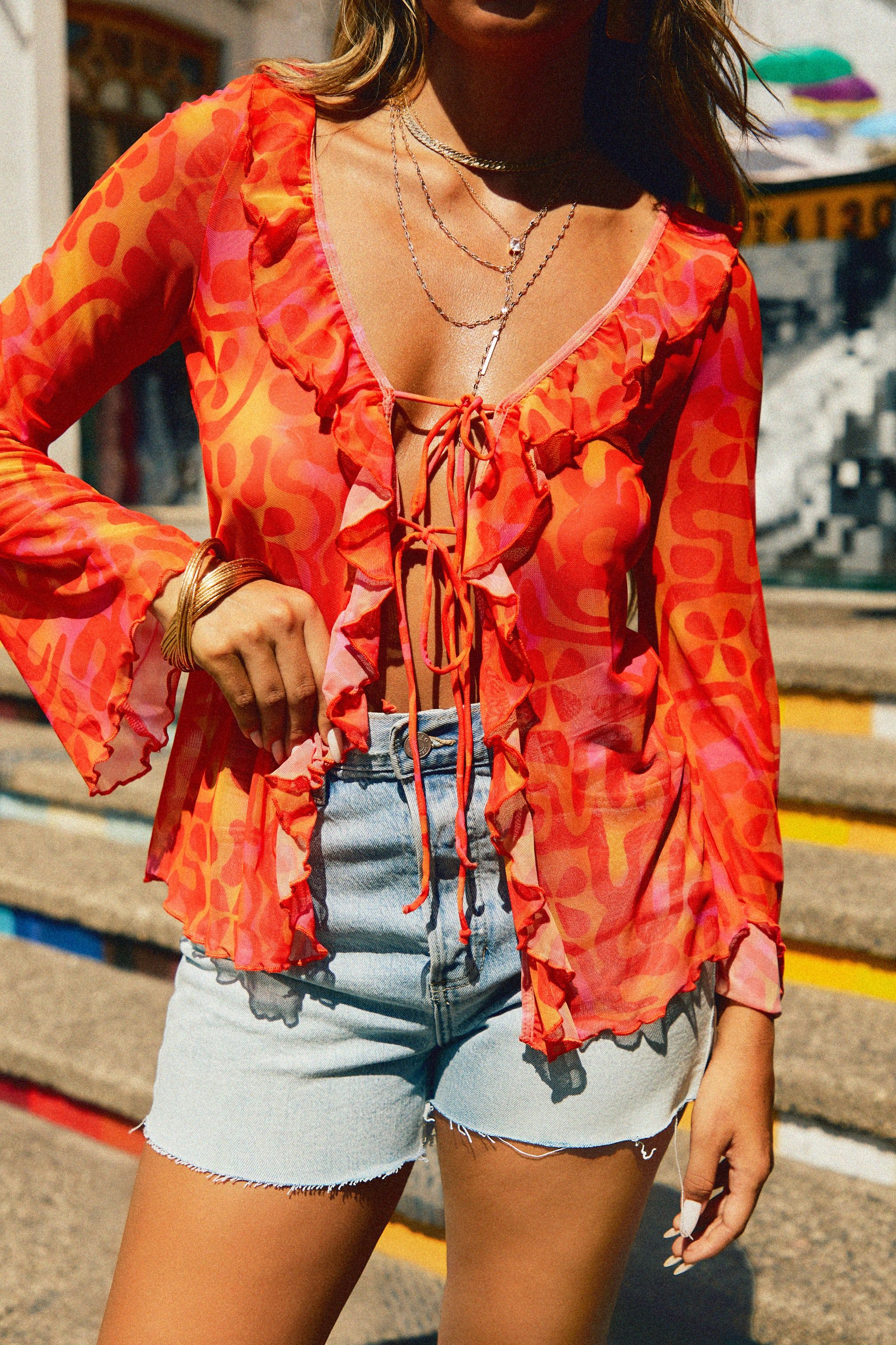 Playa Del Sol Long Sleeve Sheer Ruffle Top - Red Print sold by Miss Lola