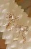 Picture Perfect Embellished Bow Tie Earring - Silver sold by Miss Lola