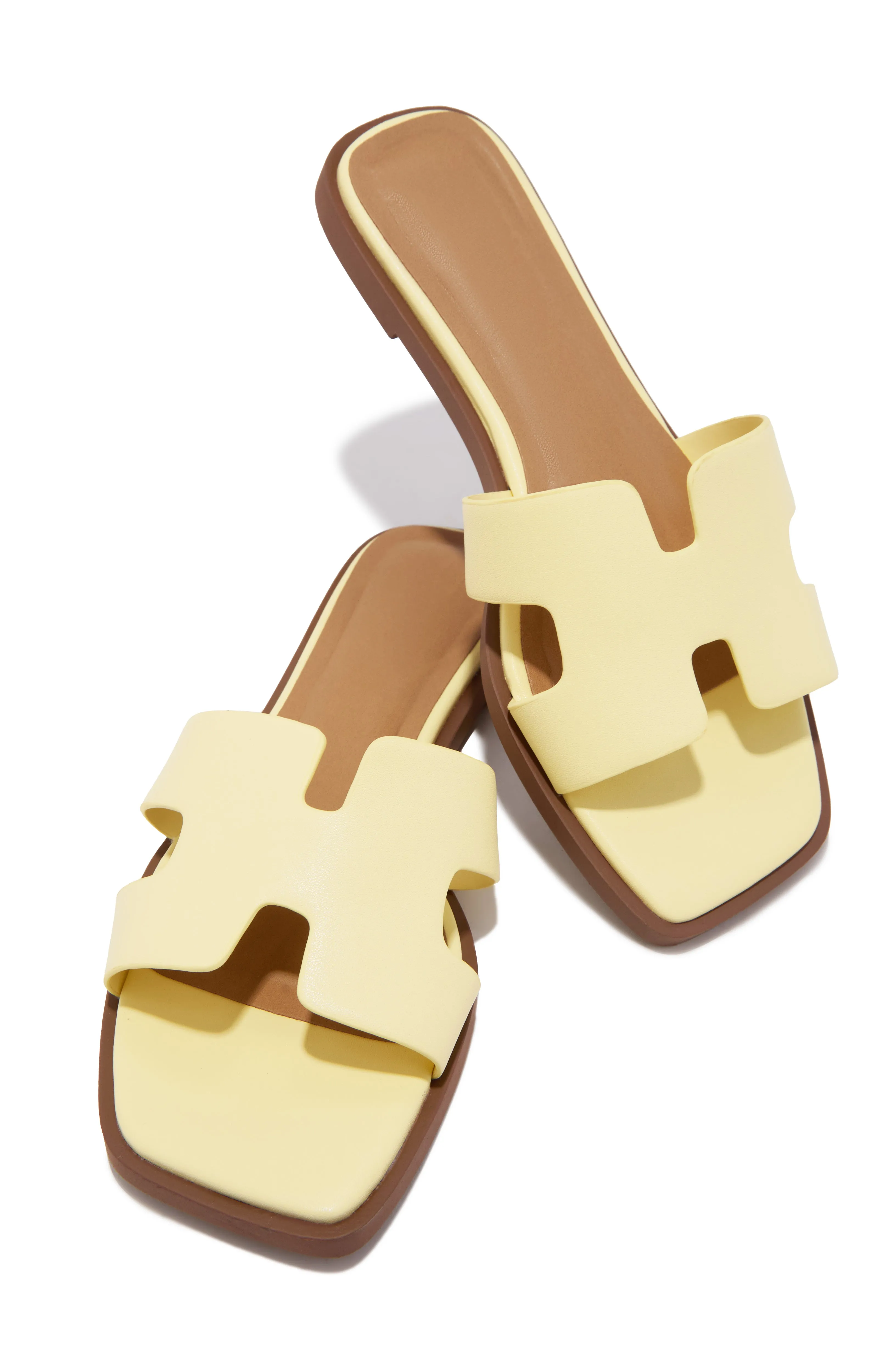 Lori Slip On Flat Sandals - Yellow sold by Miss Lola