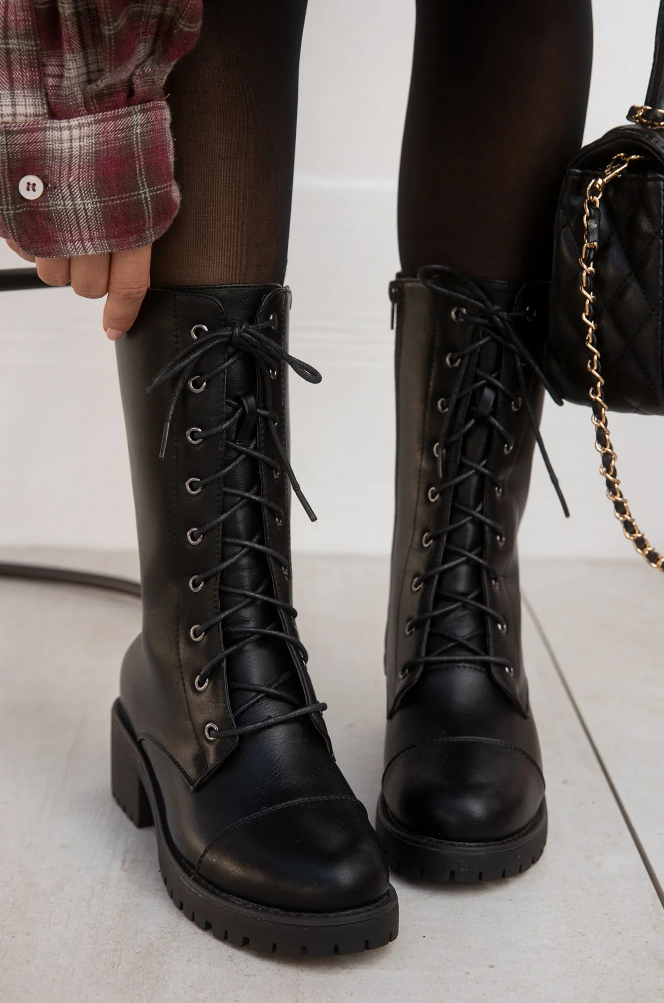 A Classic Front Lace Up Combat Boots - Black sold by Miss Lola