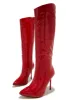Center Of Attention Asymmetric Knee High Boots - Red sold by Miss Lola