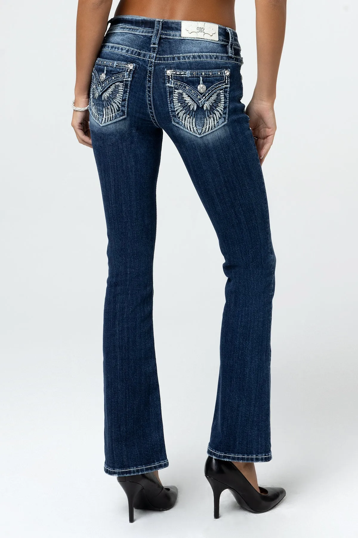 Raised Silver Wings Bootcut Jeans sold by Miss Me
