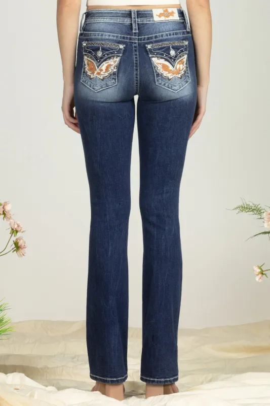 Cow Print Wing Denim sold by Miss Me