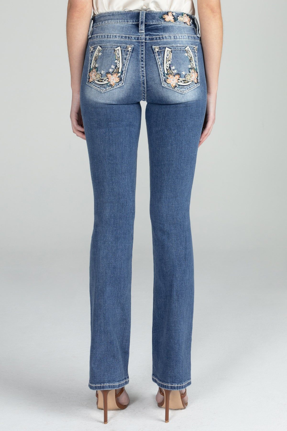 Floral Horseshoe Mid Rise Denim sold by Miss Me