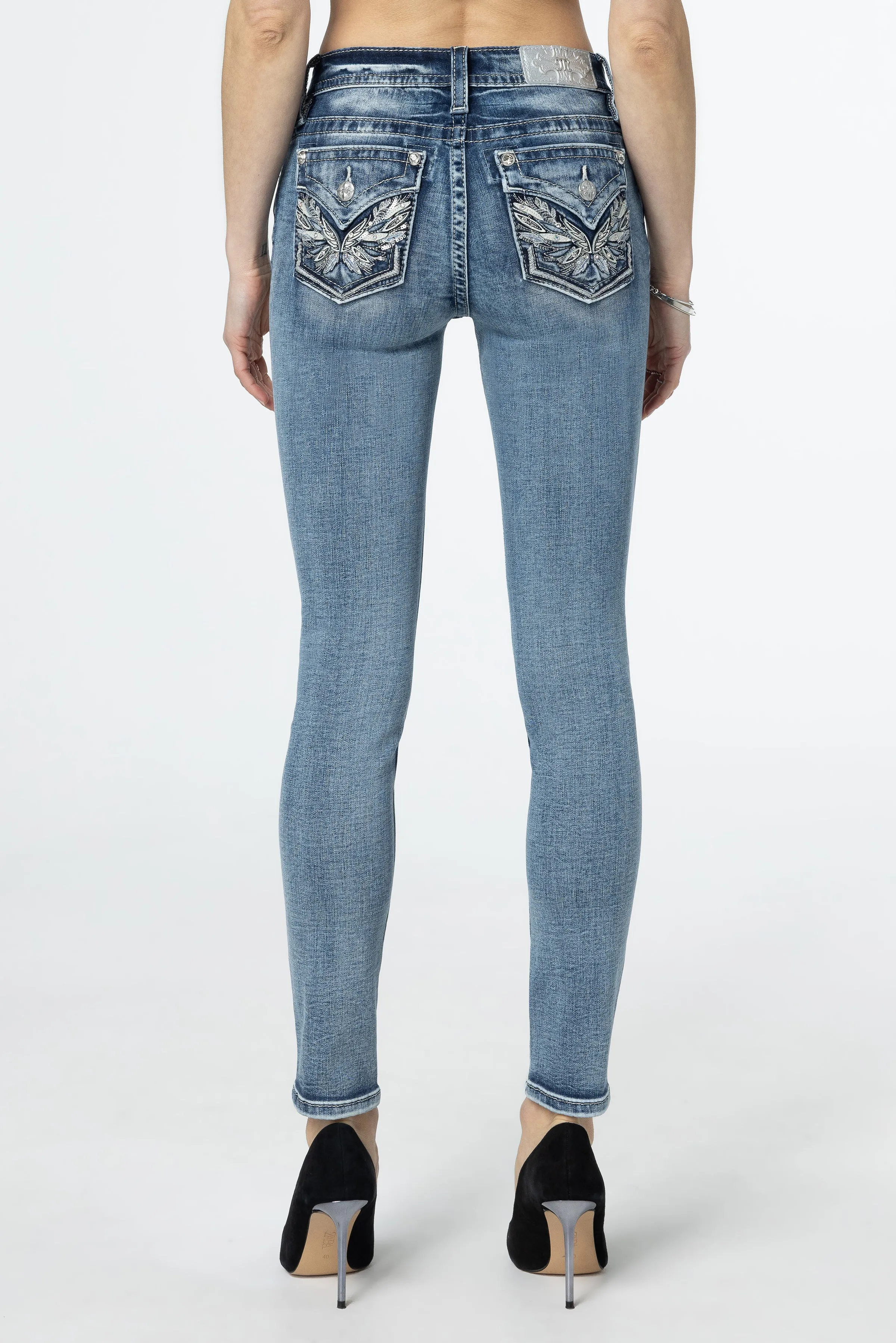 Pop Wing Skinny Jeans sold by Miss Me