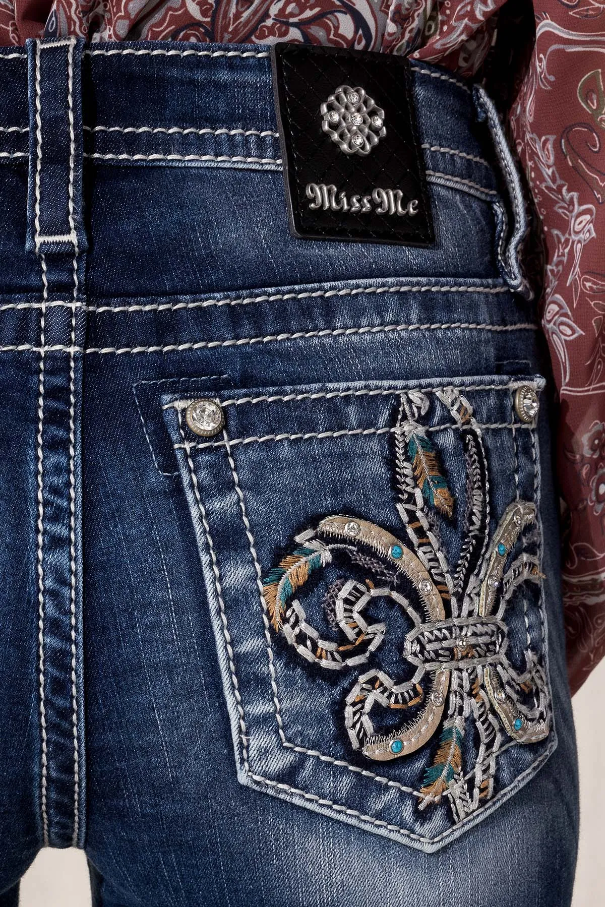 Vibrant Fleur De Lis Skinny Jeans sold by Miss Me