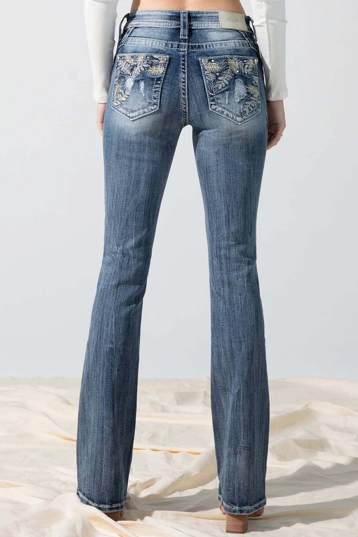Torn Garden Bootcut Jeans sold by Miss Me