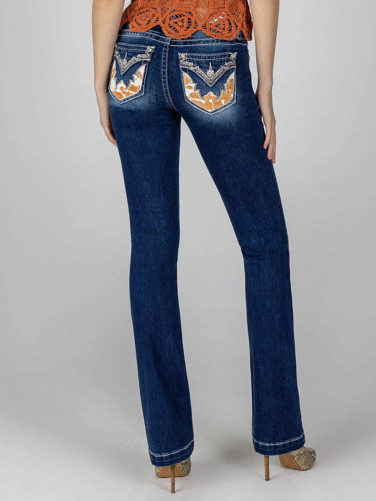Cow Print Bootcut Denim sold by Miss Me