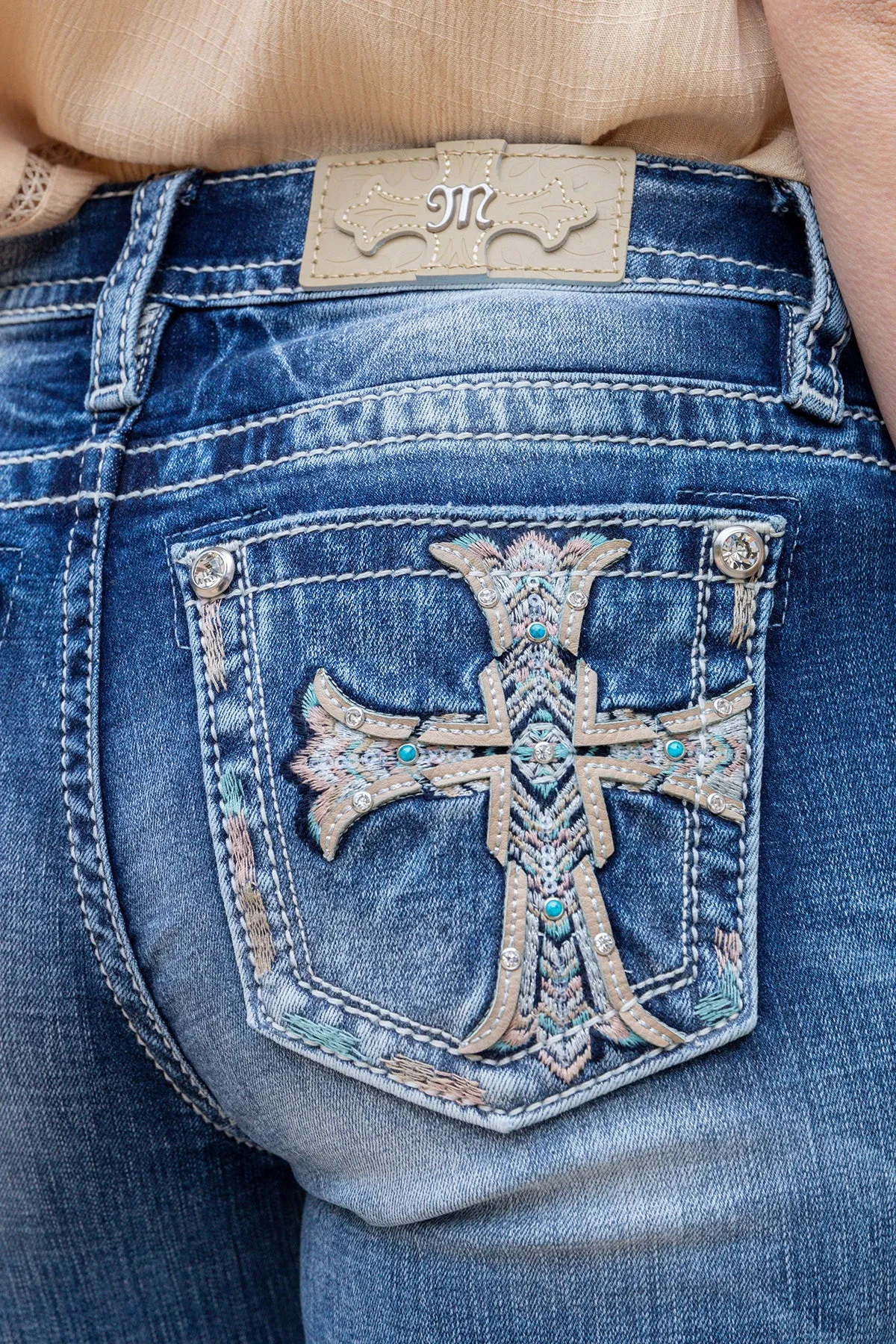 Flared Cross Denim sold by Miss Me