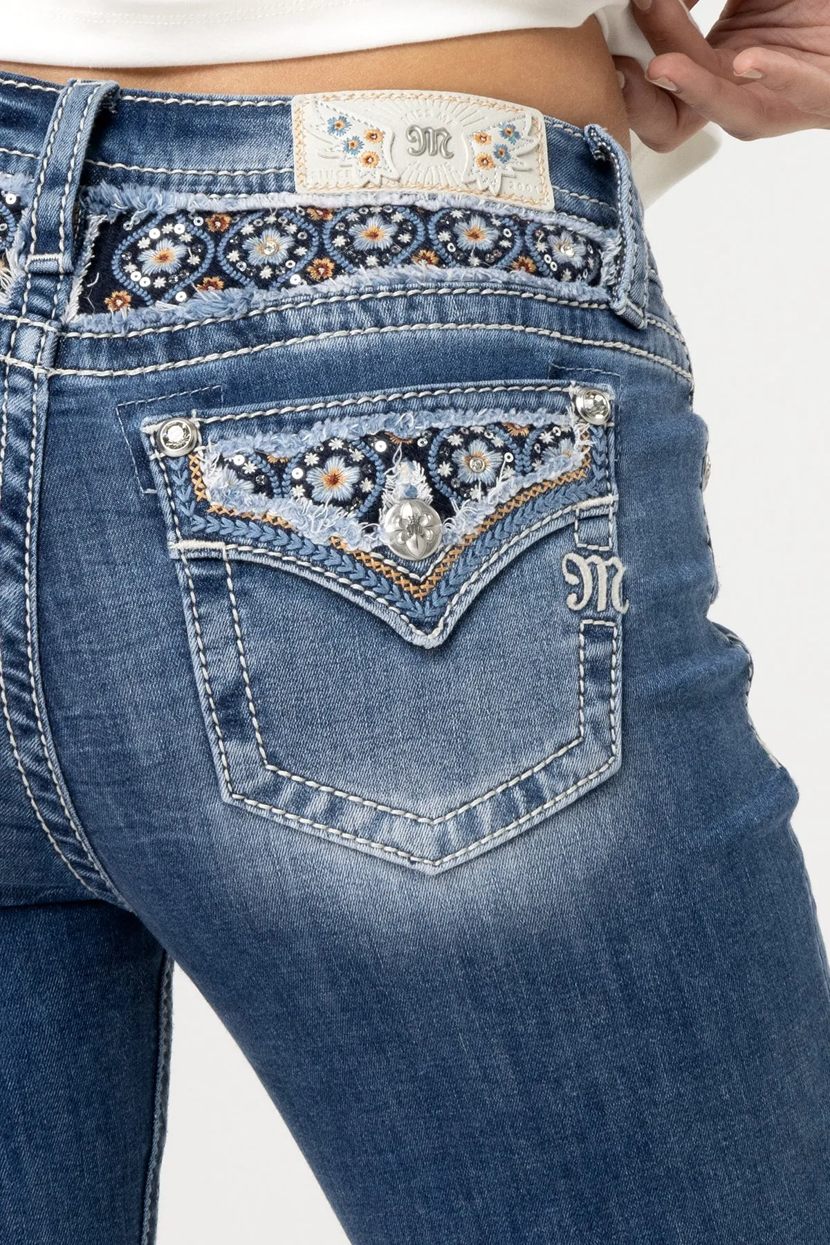 Pretty Petals Skinny Jeans sold by Miss Me