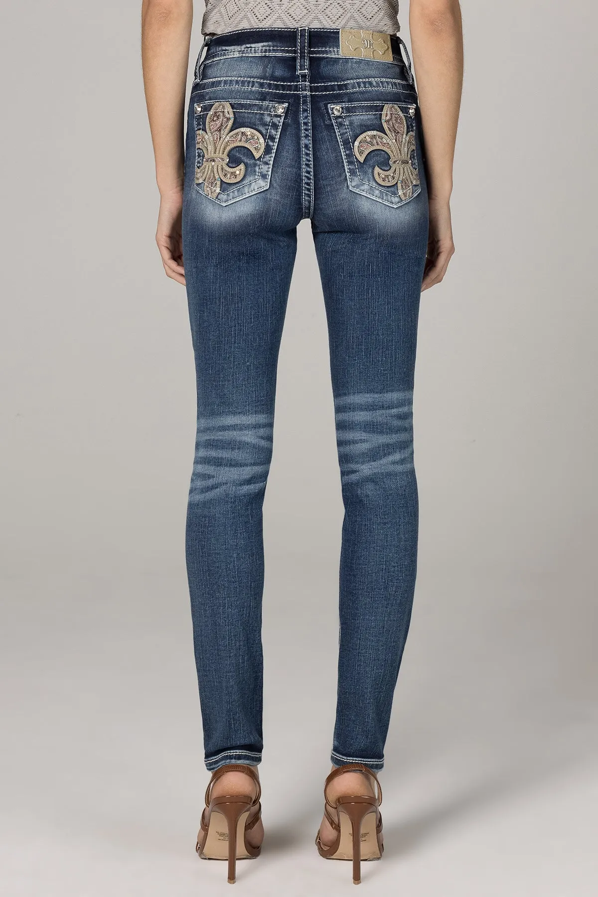 Fantastic Fleur De Lis Skinny Jeans sold by Miss Me