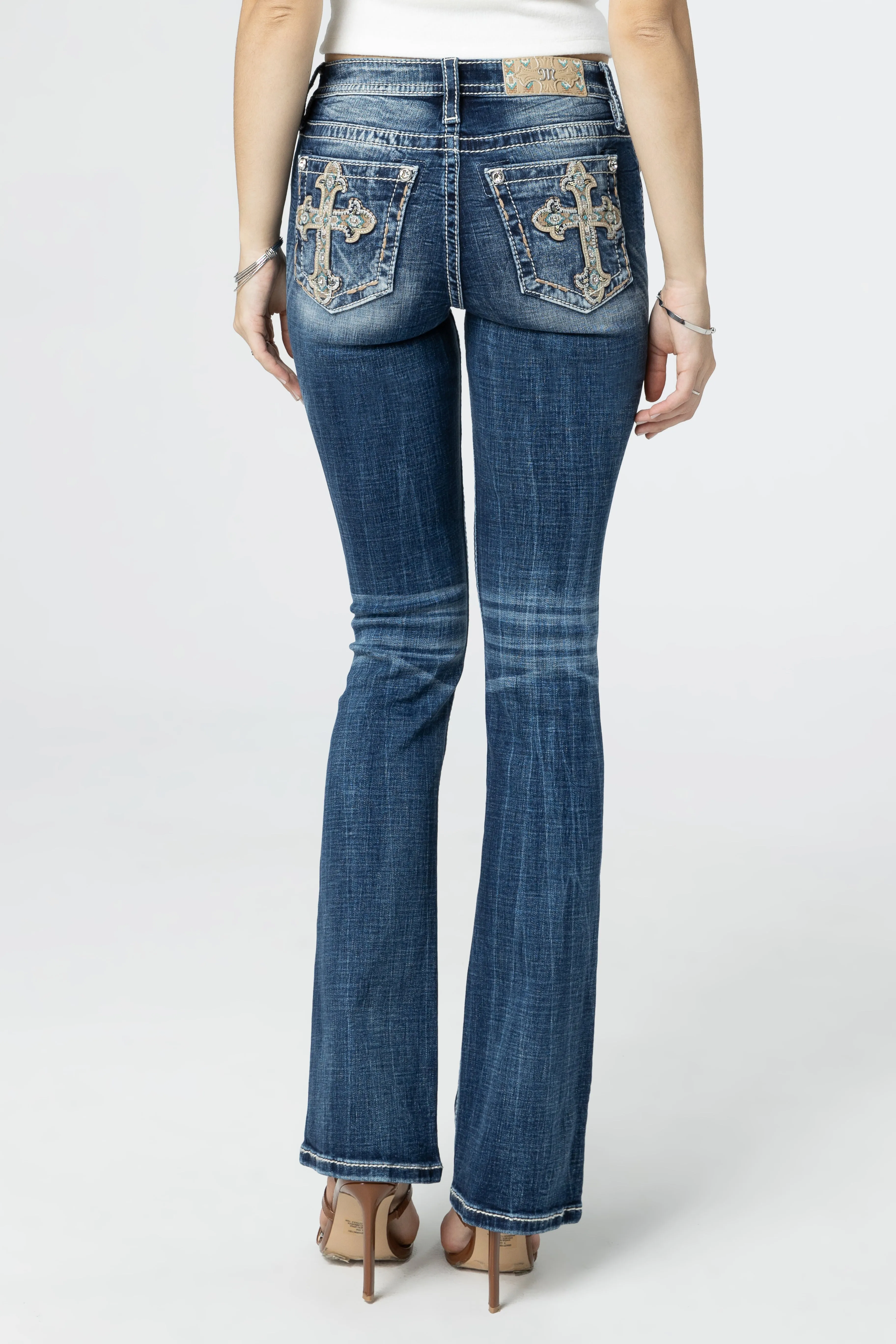 Aztec Embroidered Cross Bootcut Jeans sold by Miss Me