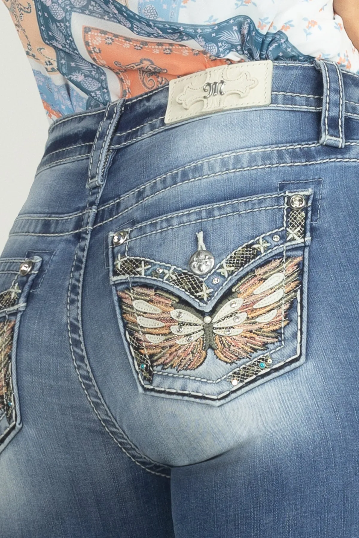 Vibrant Winged Skinny Jeans sold by Miss Me