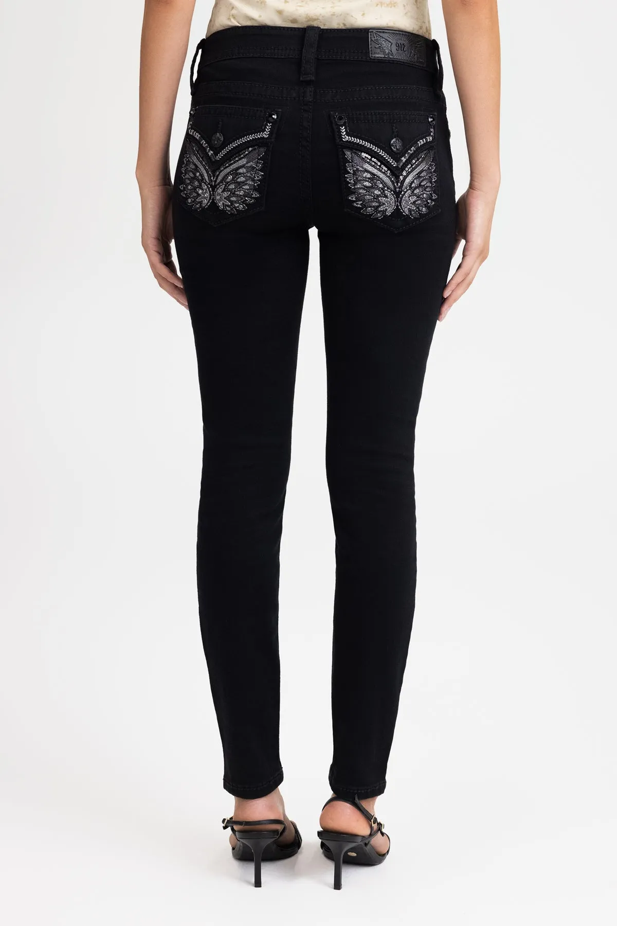Eclipse Wings Skinny Jeans sold by Miss Me