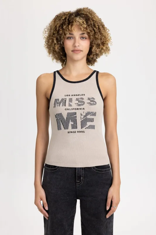 Sasha Graphic Tank sold by Miss Me