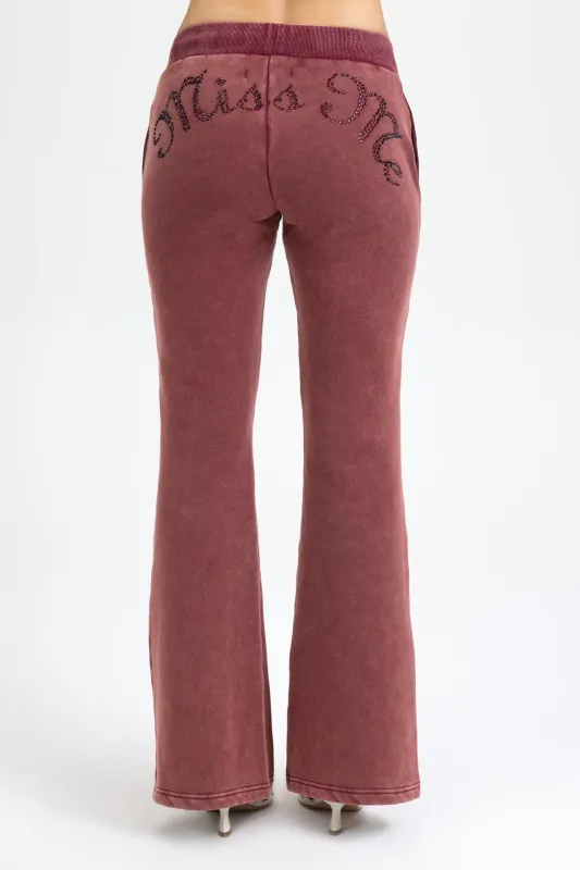 Loves It More Rhinestone Sweatpants sold by Miss Me