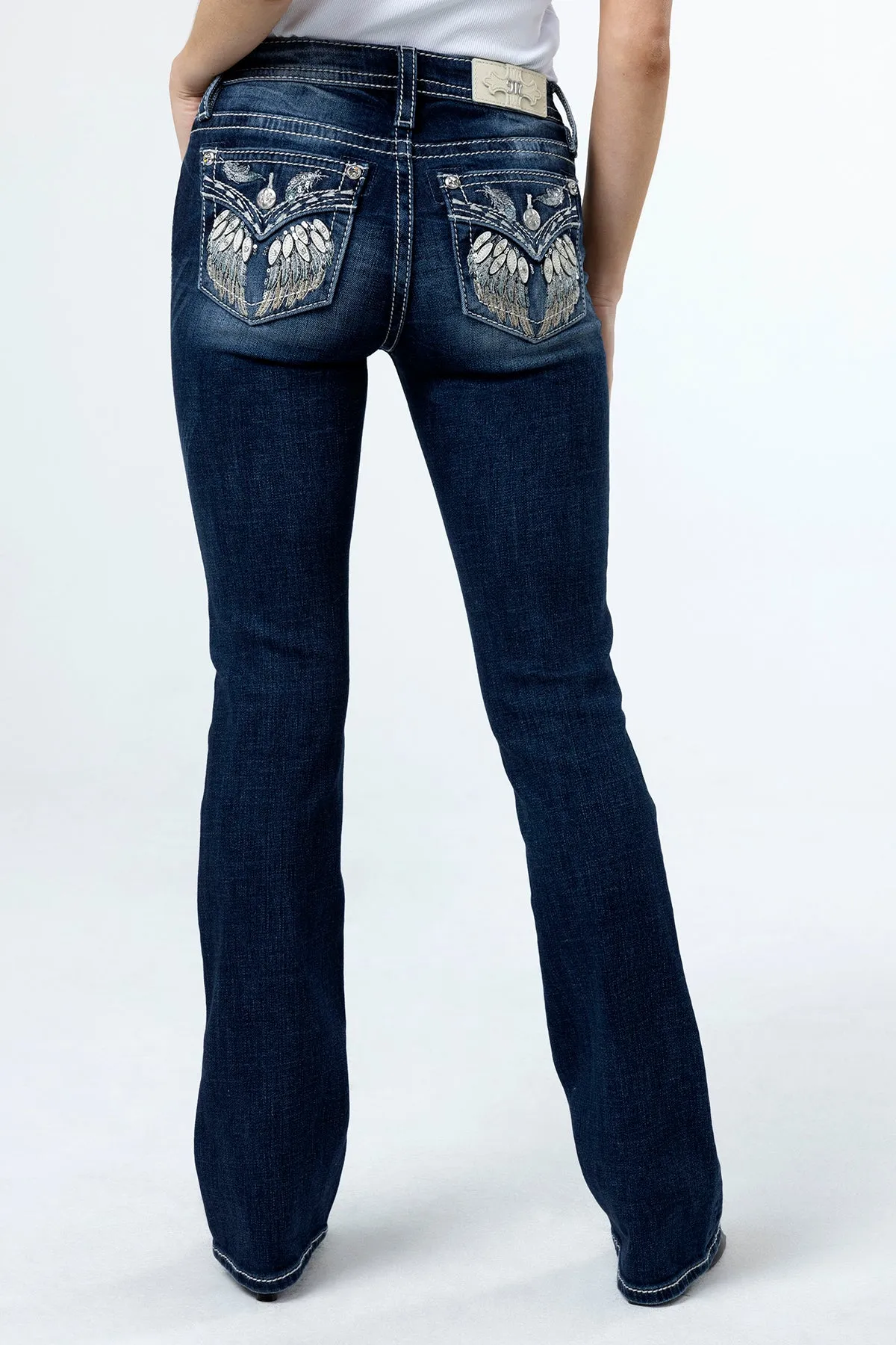 Of a Feather Bootcut Jeans sold by Miss Me