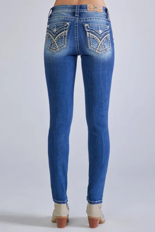 Love Crossed Skinny Jeans sold by Miss Me