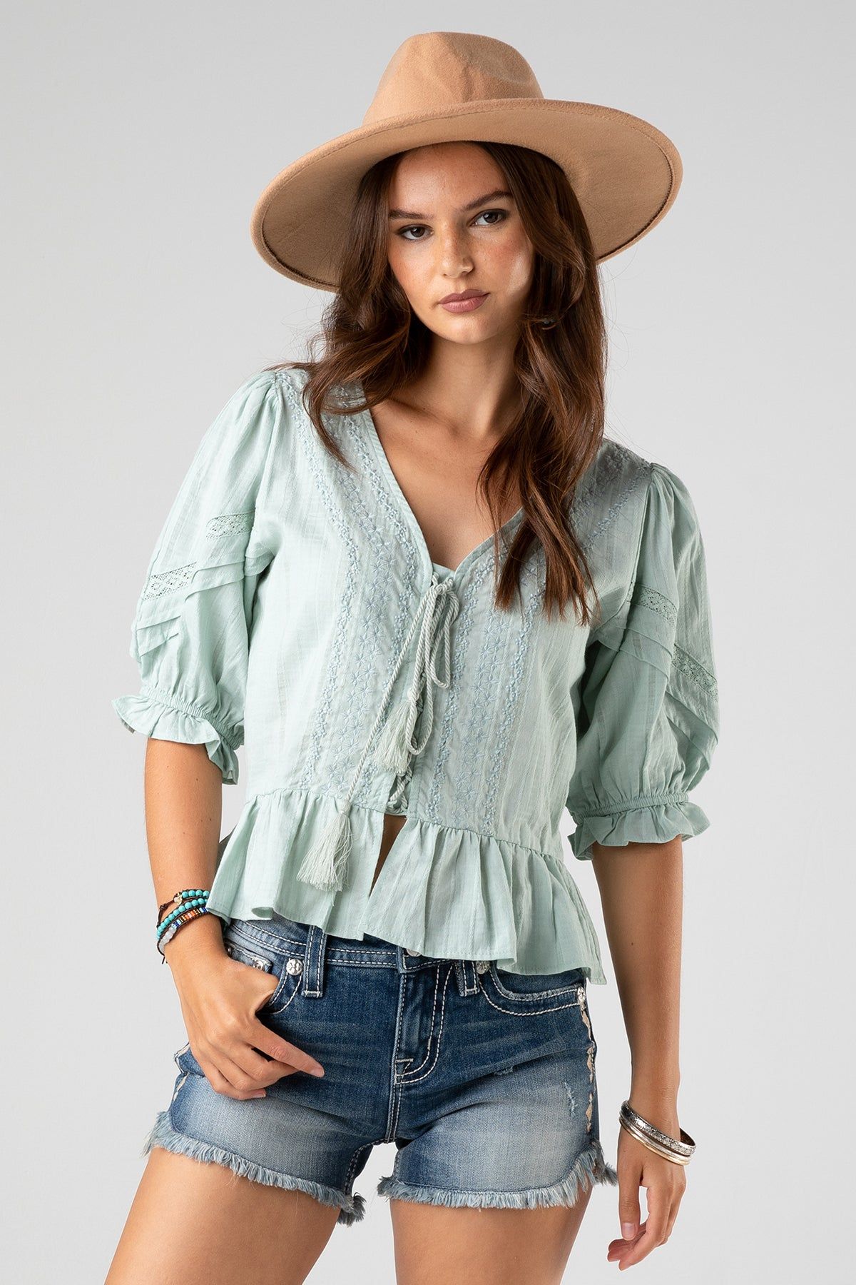 Lace Up Peplum Top sold by Miss Me