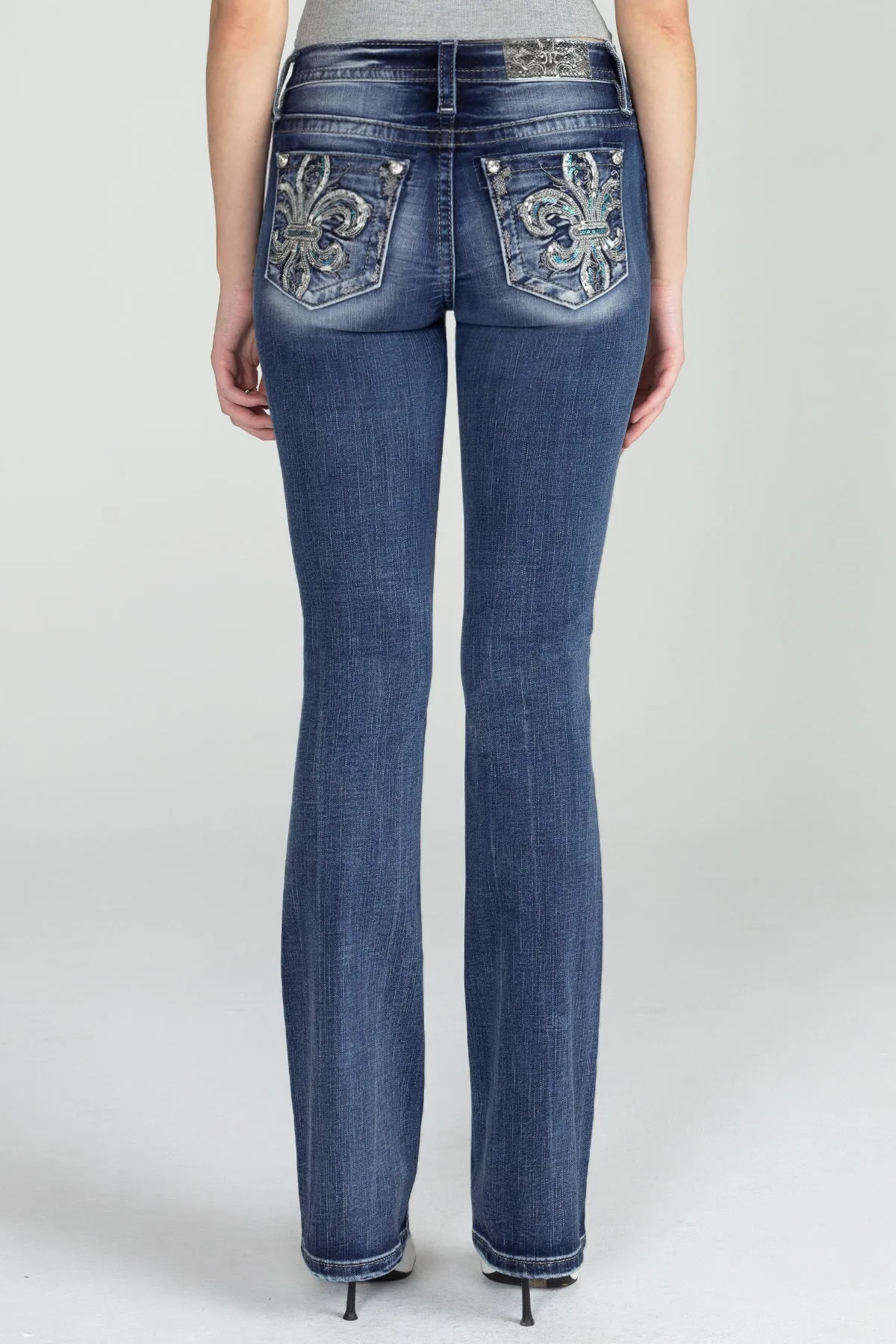 Fleur De Lis Turquoise Denim sold by Miss Me