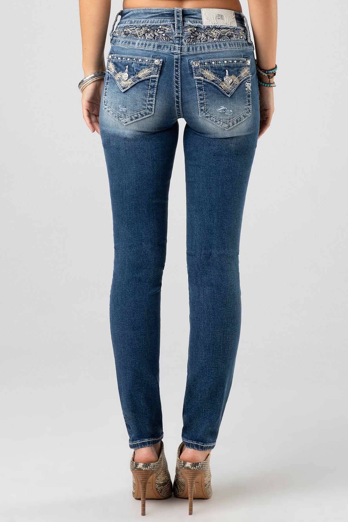 Tropic Stones Skinny Jeans sold by Miss Me