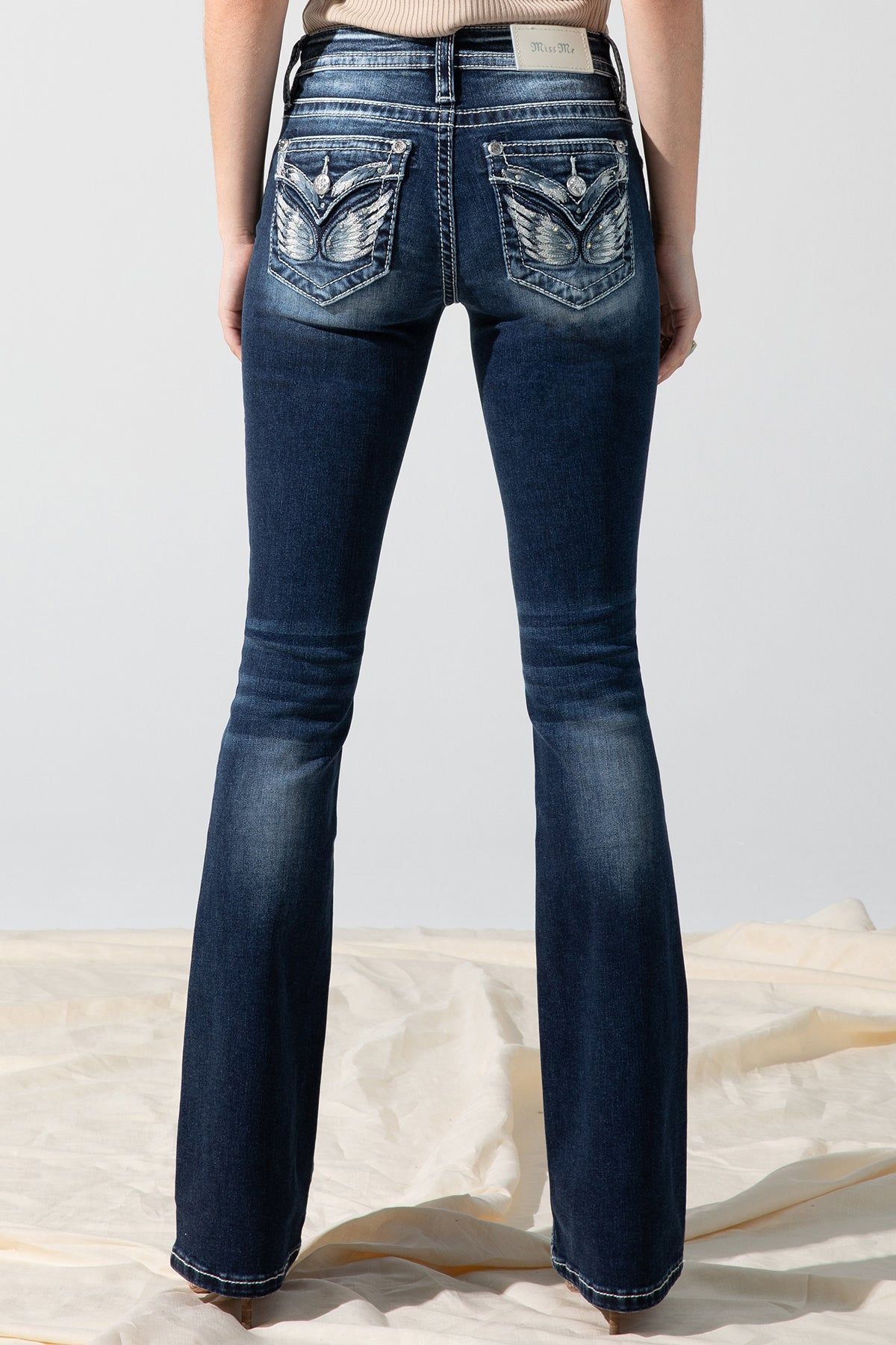 Angel Wing Bootcut Jeans sold by Miss Me