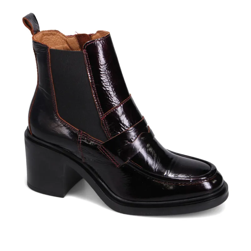 Dorrian Patent Heeled Boot sold by Miz Mooz