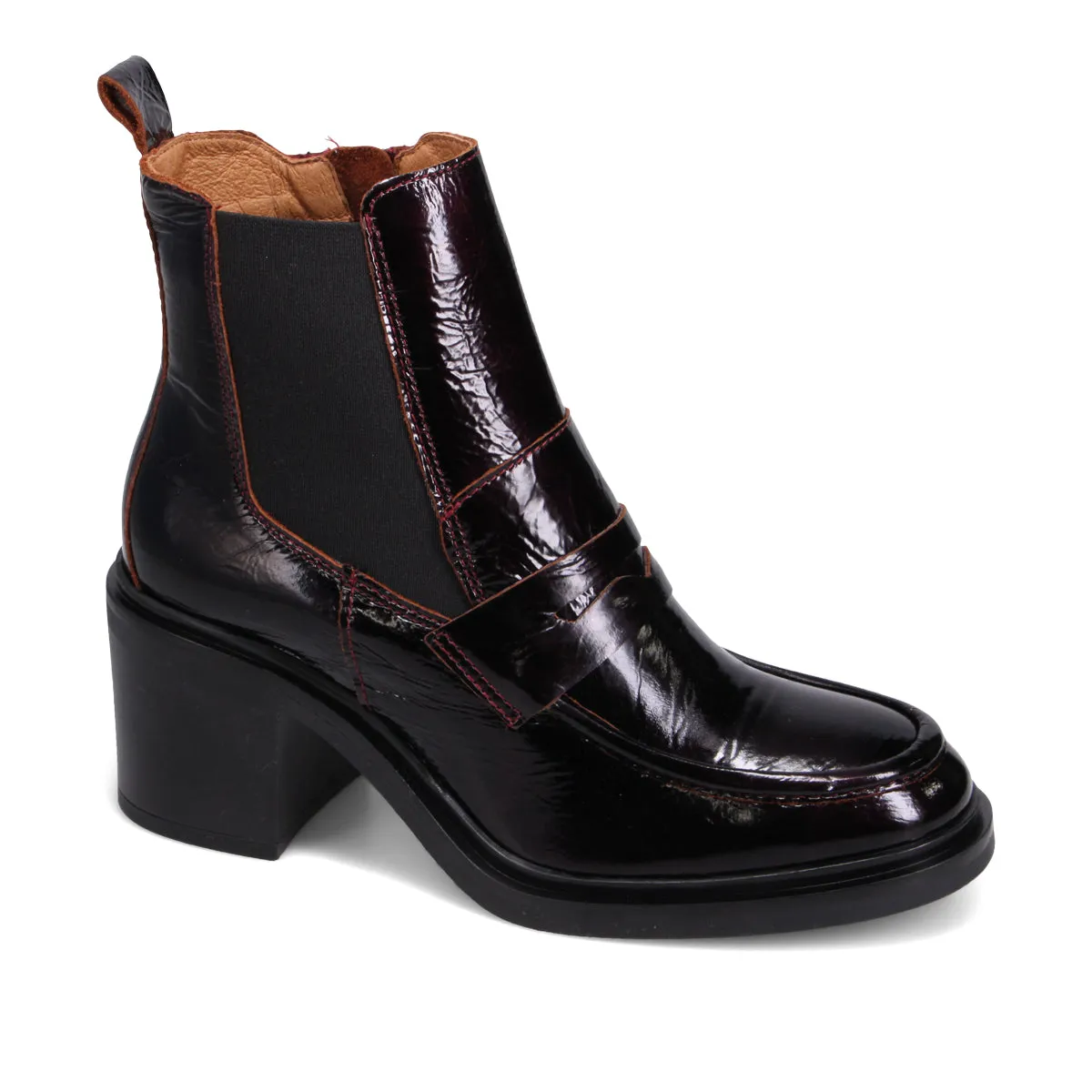 Dorrian Patent Heeled Boot sold by Miz Mooz