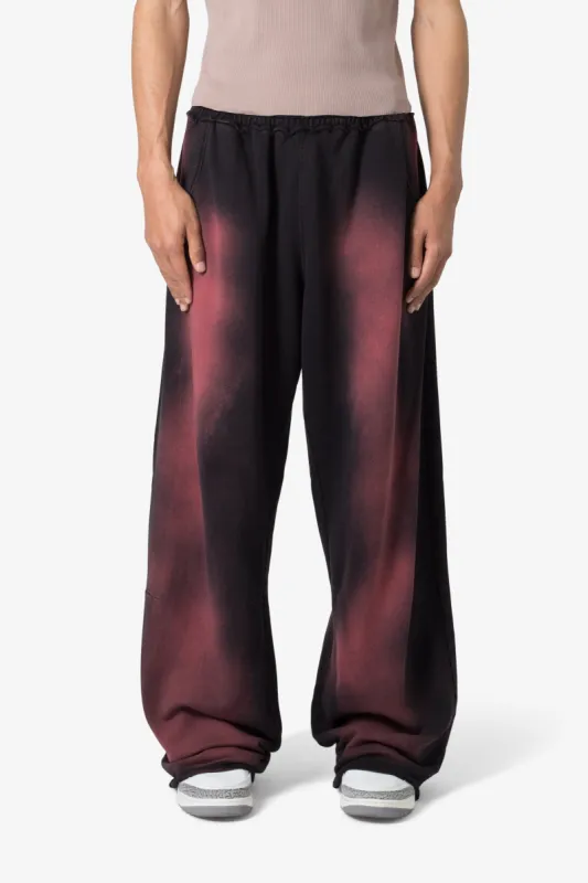Sprayed Ultra Baggy Sweatpants - Black/Red sold by MNML
