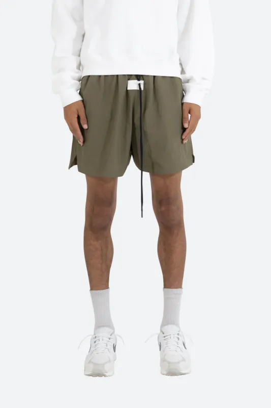 Basic Runner Shorts - Olive sold by MNML