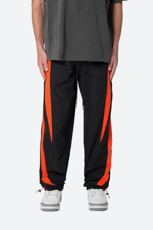 Striped Track Pants - Black/Orange sold by MNML