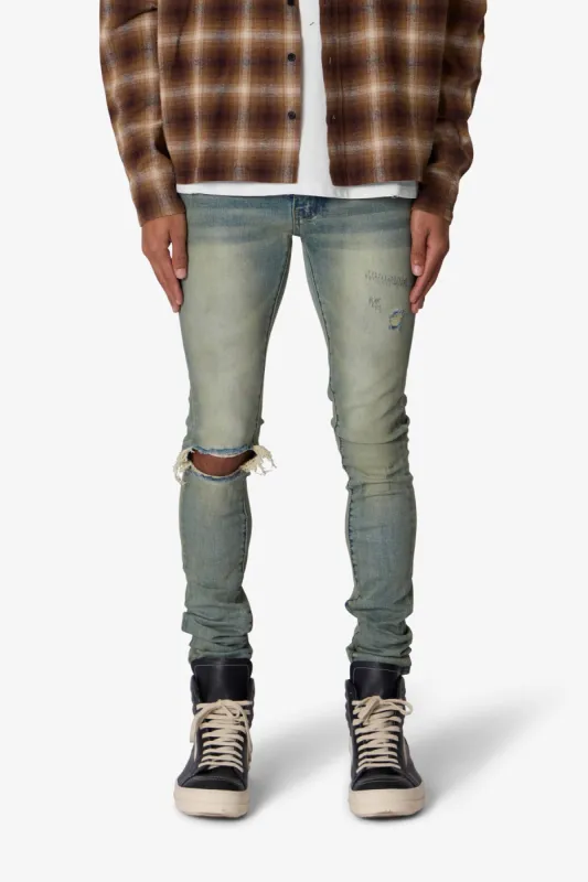 X721 Dusted Skinny Denim - 4th Day Sun Washed Blue sold by MNML