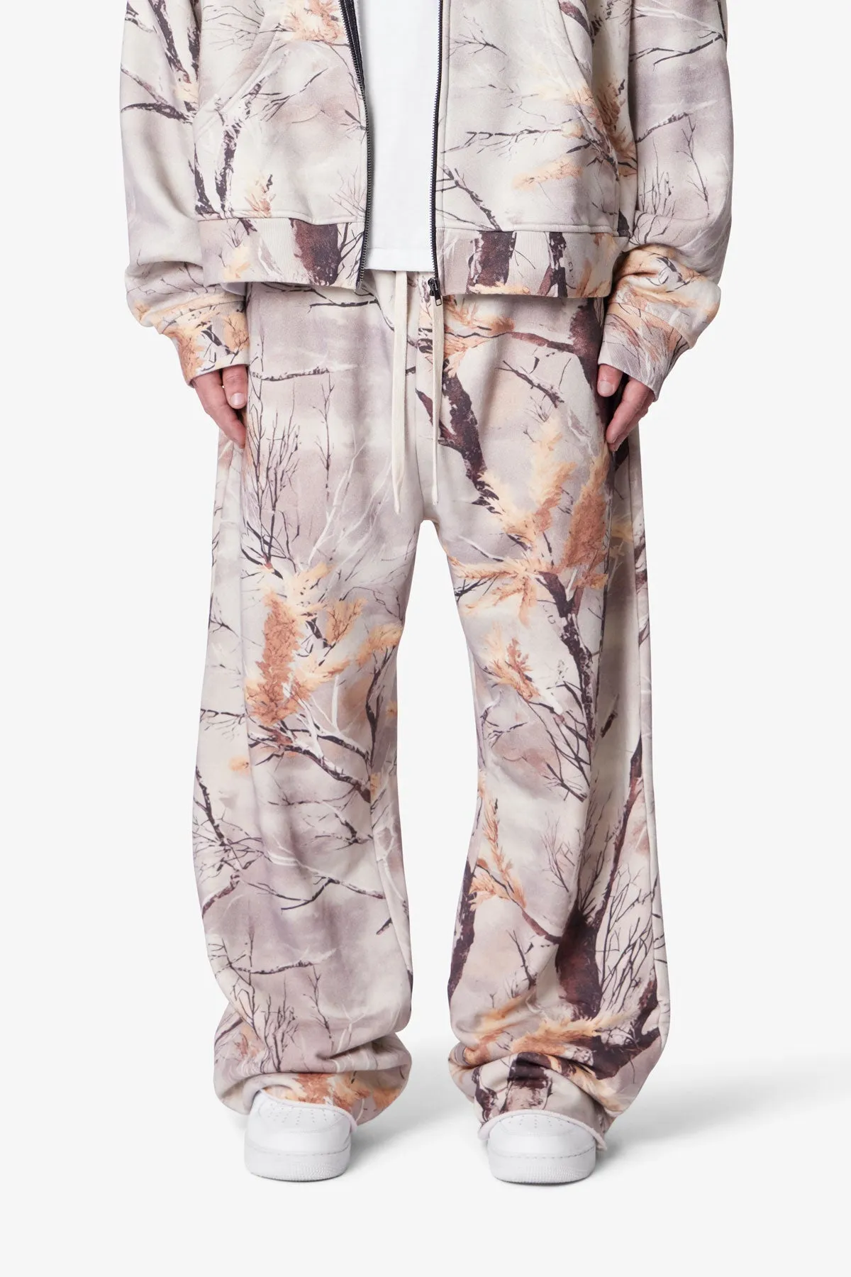 Ultra Baggy Fleece Sweatpants - Snow Camo sold by MNML