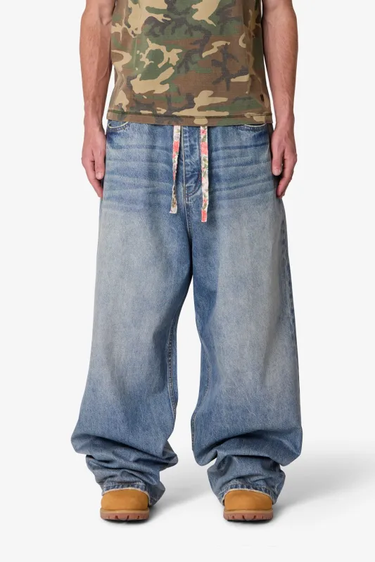 Mega Baggy Waxed Denim - Medium Blue sold by MNML