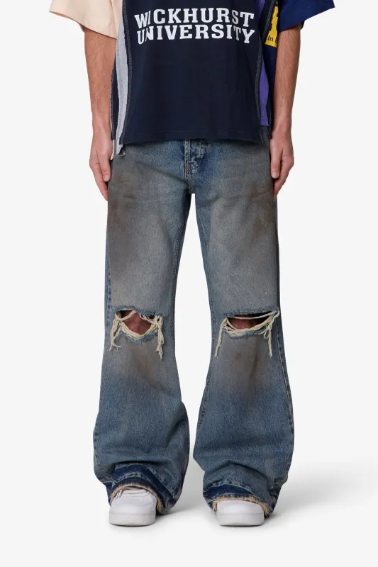 Distressed Kick Flare Denim - Washed Blue sold by MNML