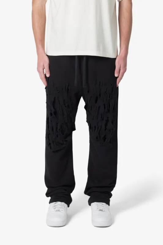 Shredded Layered Baggy Sweatpants - Black sold by MNML