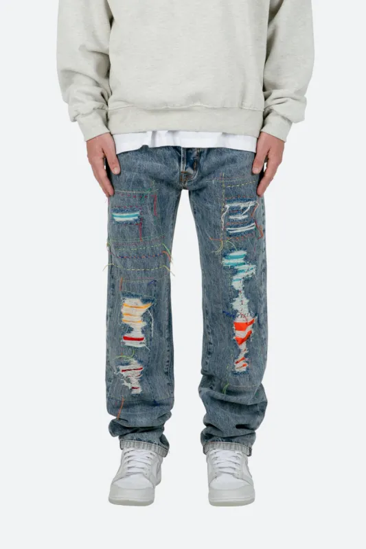 V483 Repaired Baggy Denim - Blue sold by MNML
