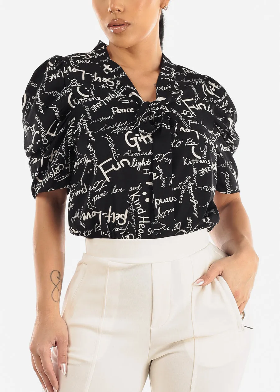 Black Short Sleeve Neck Tie Printed Blouse sold by Moda