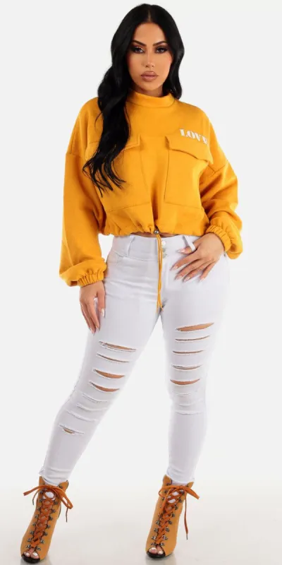 White Distressed Butt Lifting Skinny Jeans with Yellow Long Sleeve Cropped Pullover sold by Moda