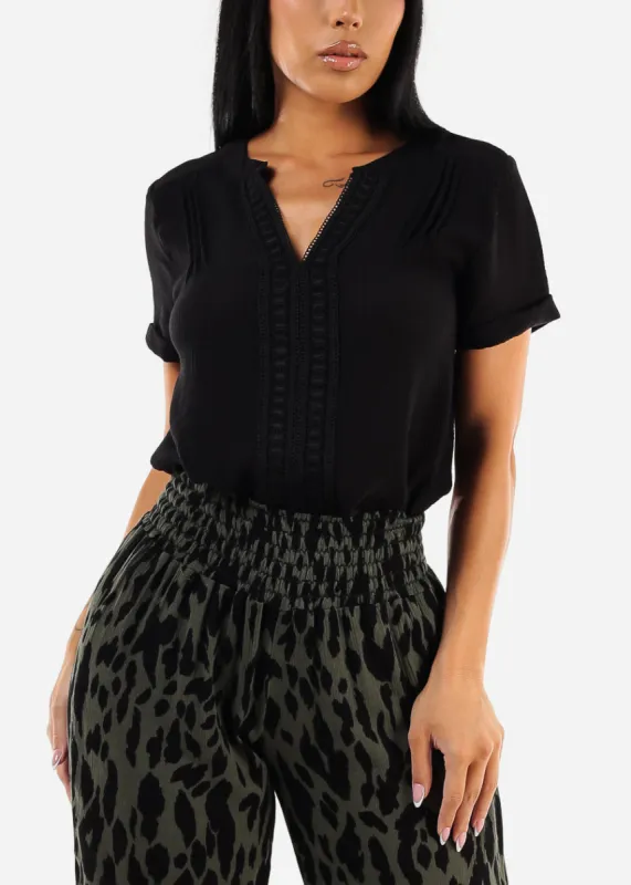 Short Sleeve Black Vneck Woven Top w Lace Trim sold by Moda