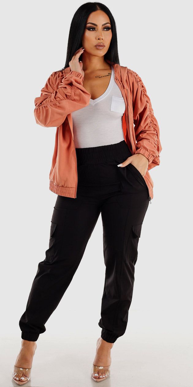 Thick Waist Black Cargo Joggers Short Sleeve White Bodysuit and Rust Ruched Zip Up Jacket sold by Moda