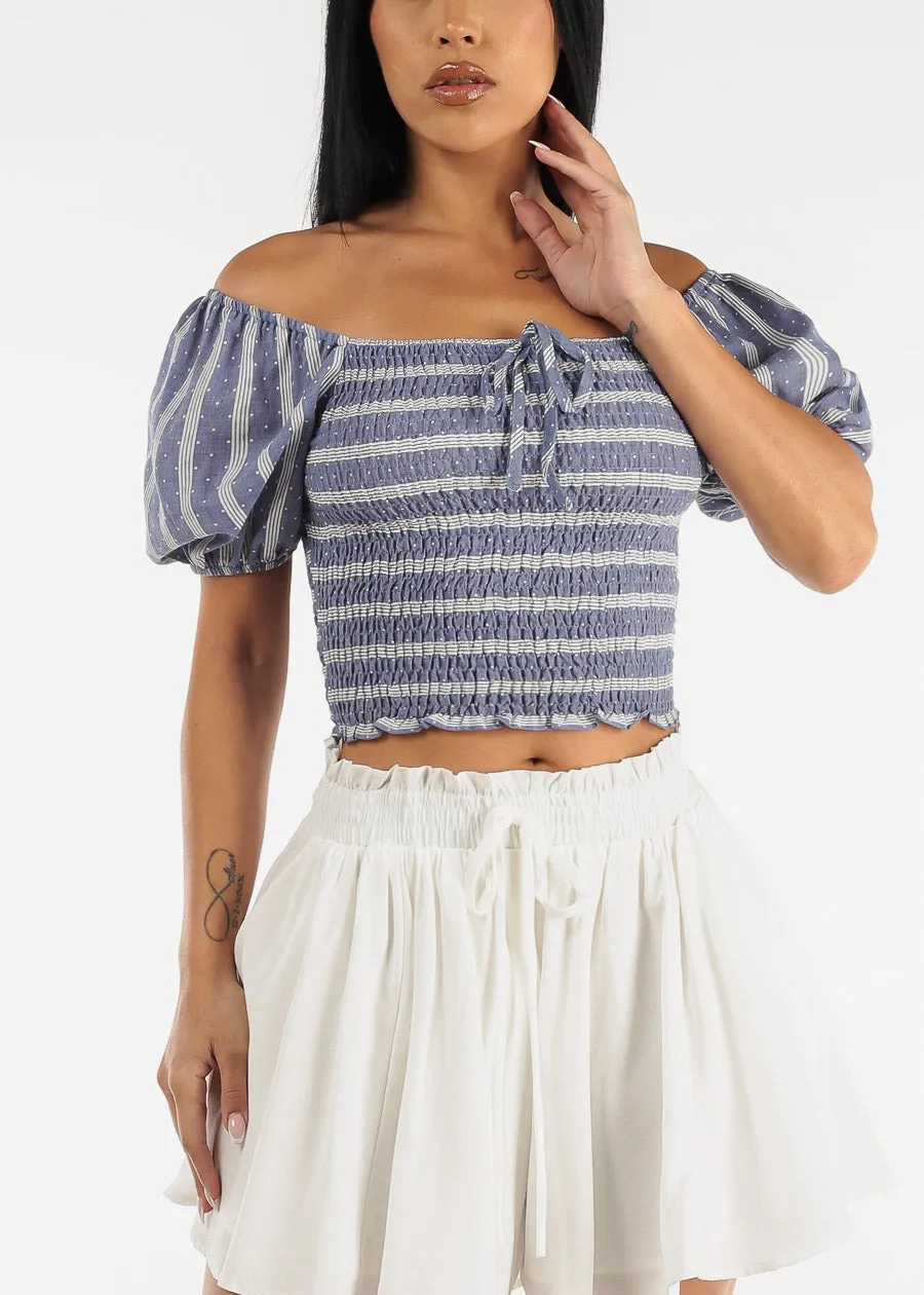 Short Puff Sleeve Smocked Denim Crop Top sold by Moda