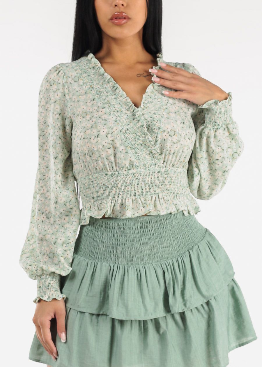 Long Sleeve Floral Surplice Smocked Top Mint sold by Moda