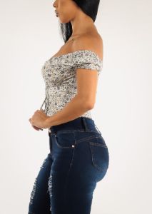 Off Shoulder Lace Up Front White Floral Top sold by Moda
