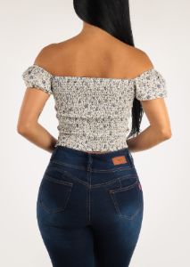 Off Shoulder Lace Up Front White Floral Top sold by Moda