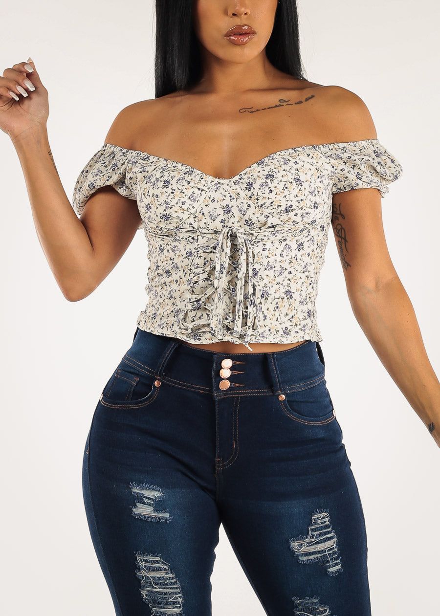Off Shoulder Lace Up Front White Floral Top sold by Moda