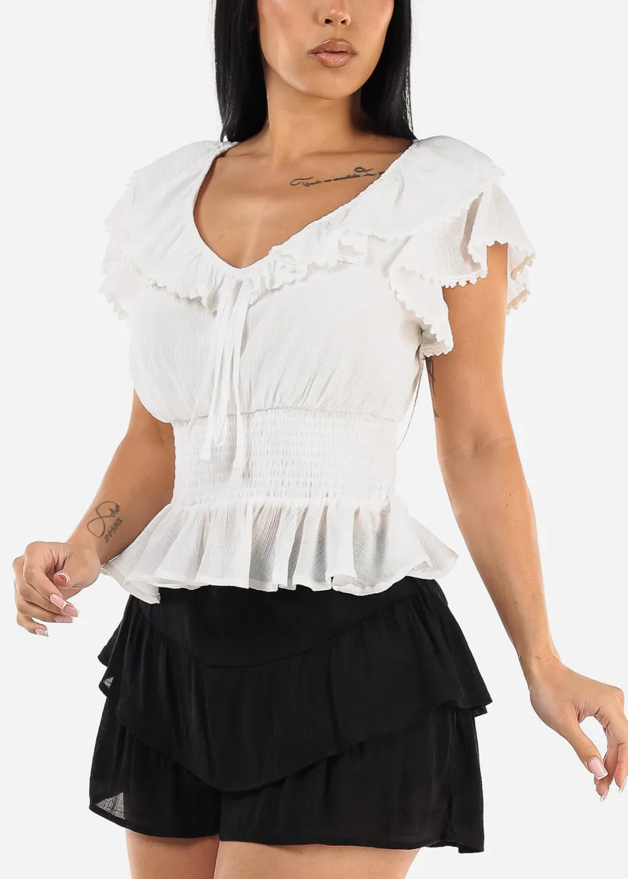 White Short Sleeve Ruffled Top w Shirred Waist sold by Moda
