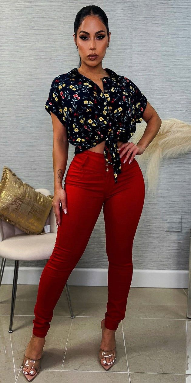 Red High Rise Levantacola Skinny Jeans with Navy Short Sleeve Drawstring Hem Floral Blouse sold by Moda