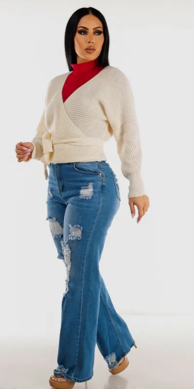 Light Wash Ripped Wide Leg Straight Jeans Ruched Mock Neck Long Sleeve Red Top and Ivory Surplice Knitted Sweater sold by Moda