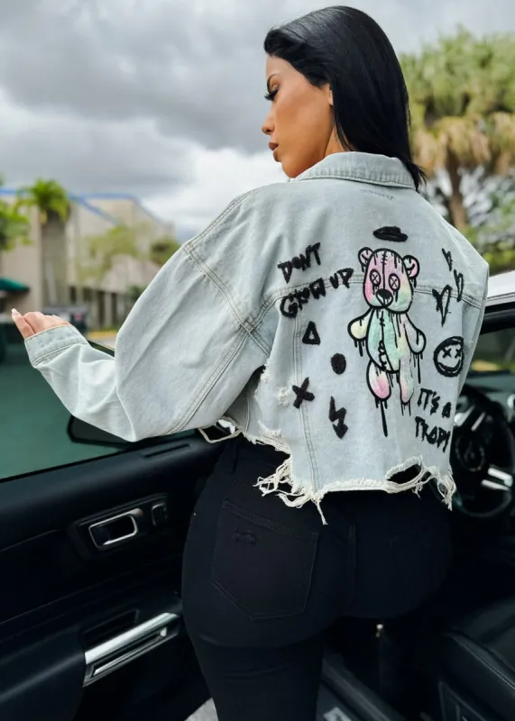 Graphic Cropped Light Denim Jacket "Don't Grow Up" sold by Moda